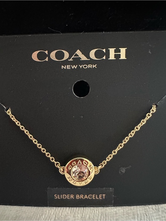 Coach Jewelry - Coach Gold-Tone Bracelet with Light Pink Crystal